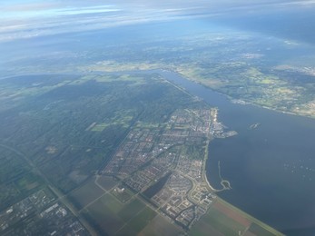 Picturesque view of city through plane window during flight