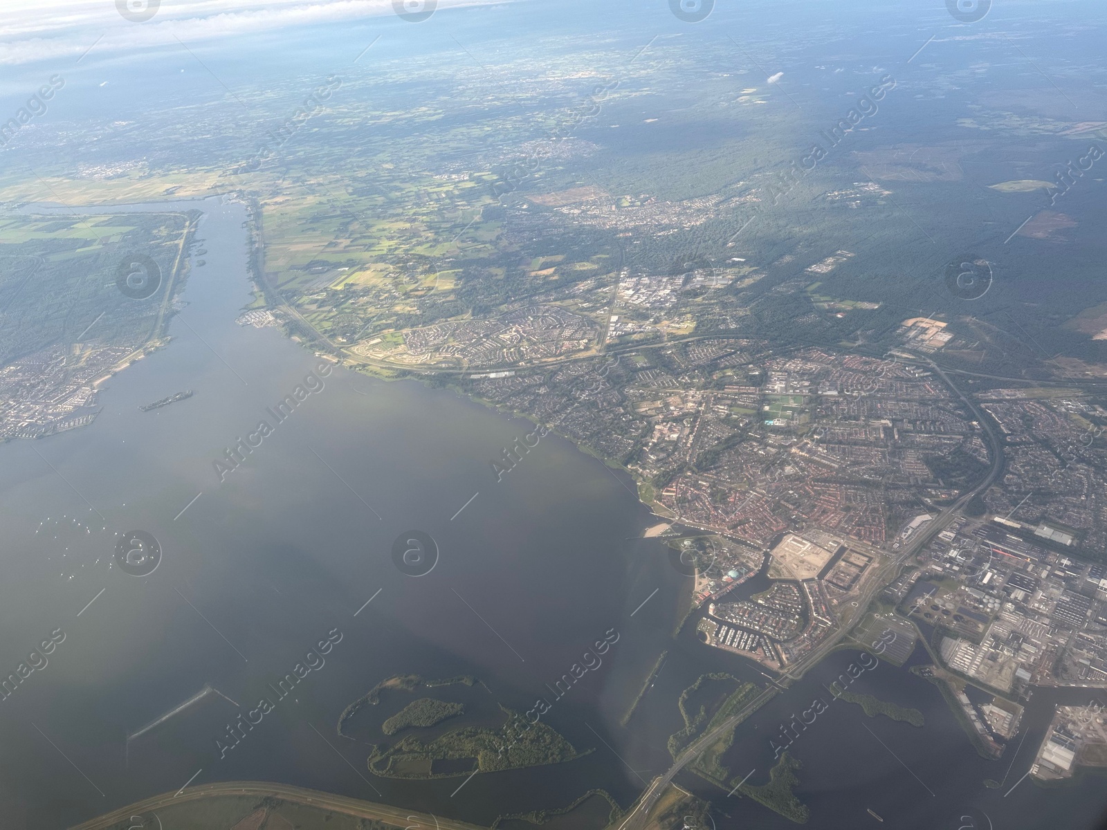 Photo of Picturesque view of city through plane window during flight