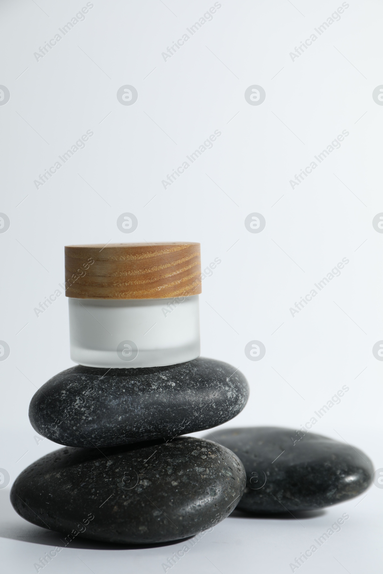 Photo of Stylish presentation of face cream on white background