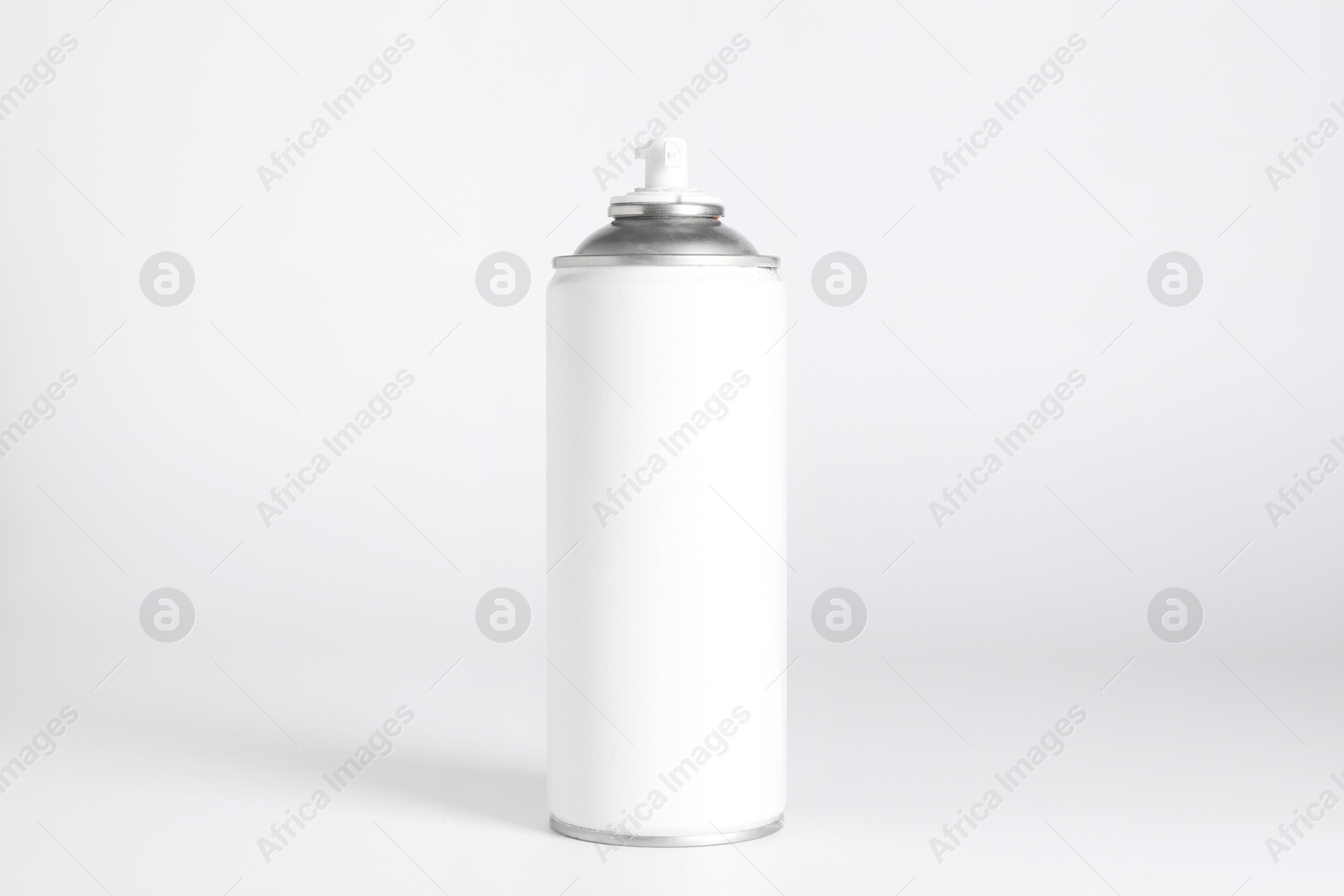 Photo of Can of spray paint on white background