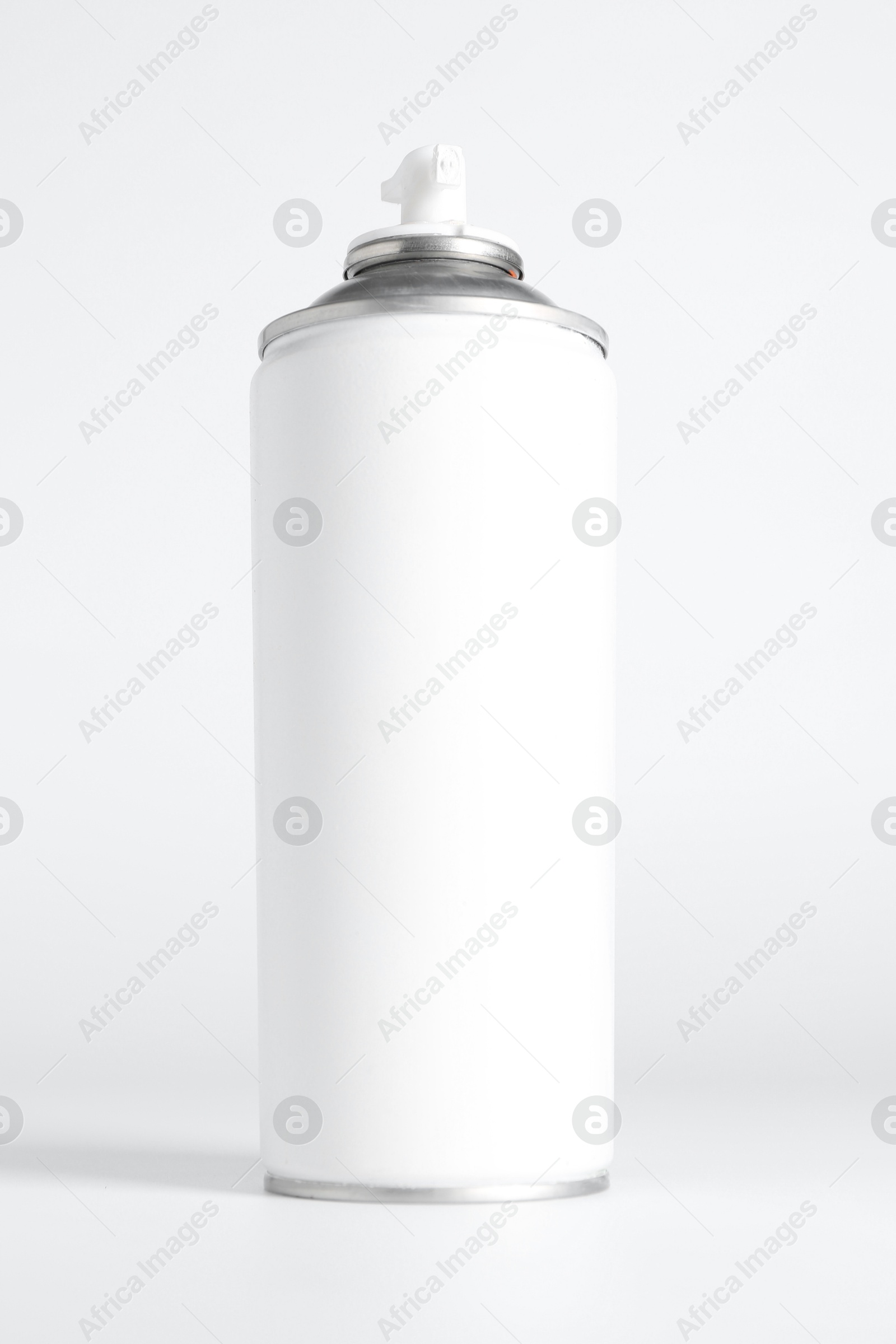 Photo of Can of spray paint on white background