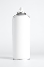 Can of spray paint on white background