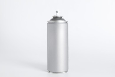 Can of spray paint on white background