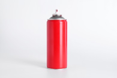 Photo of Can of spray paint on white background