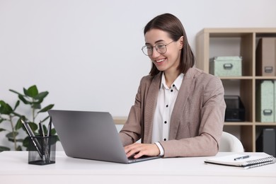 Woman with good posture working in office