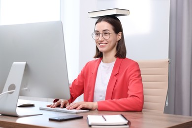 Photo of Woman with good posture working in office