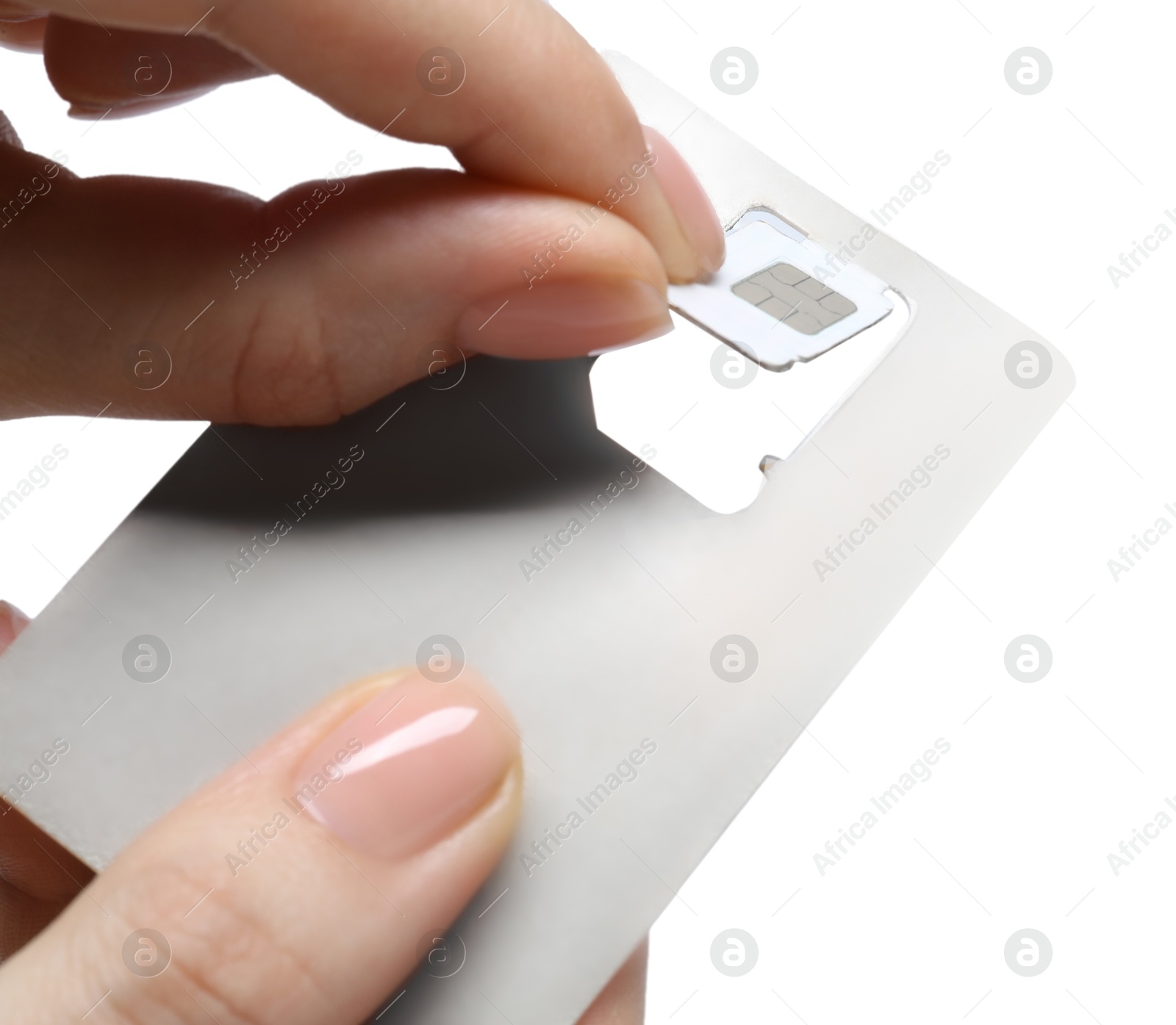 Photo of Woman removing SIM card from holder on white background, closeup