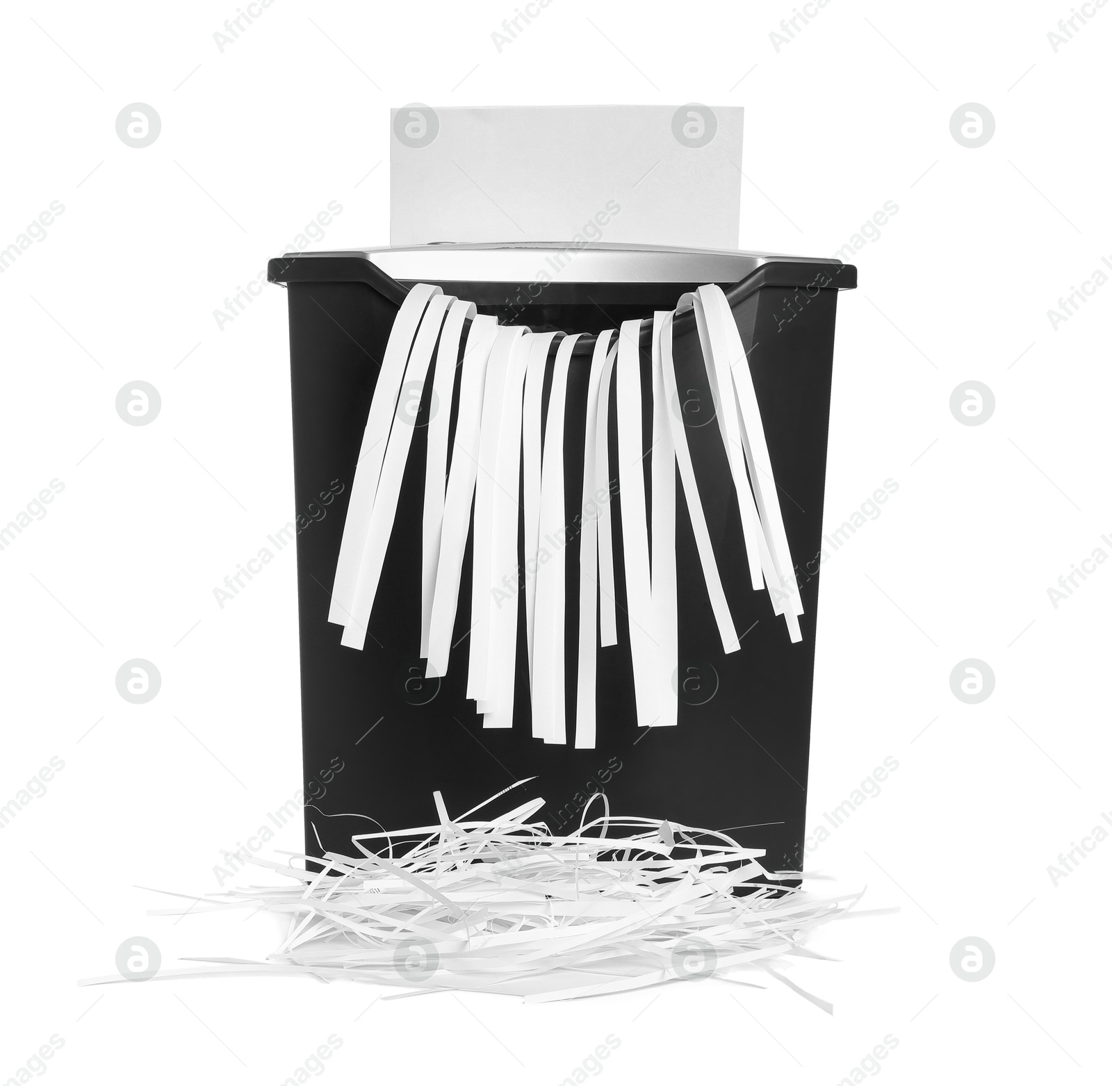 Photo of Destroying sheet of paper with shredder on white background