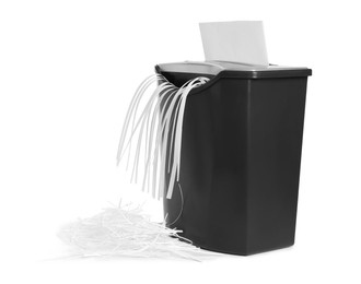 Photo of Destroying sheet of paper with shredder on white background