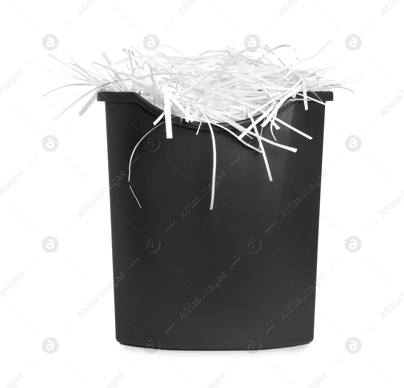 Photo of Shredded paper strips in basket isolated on white