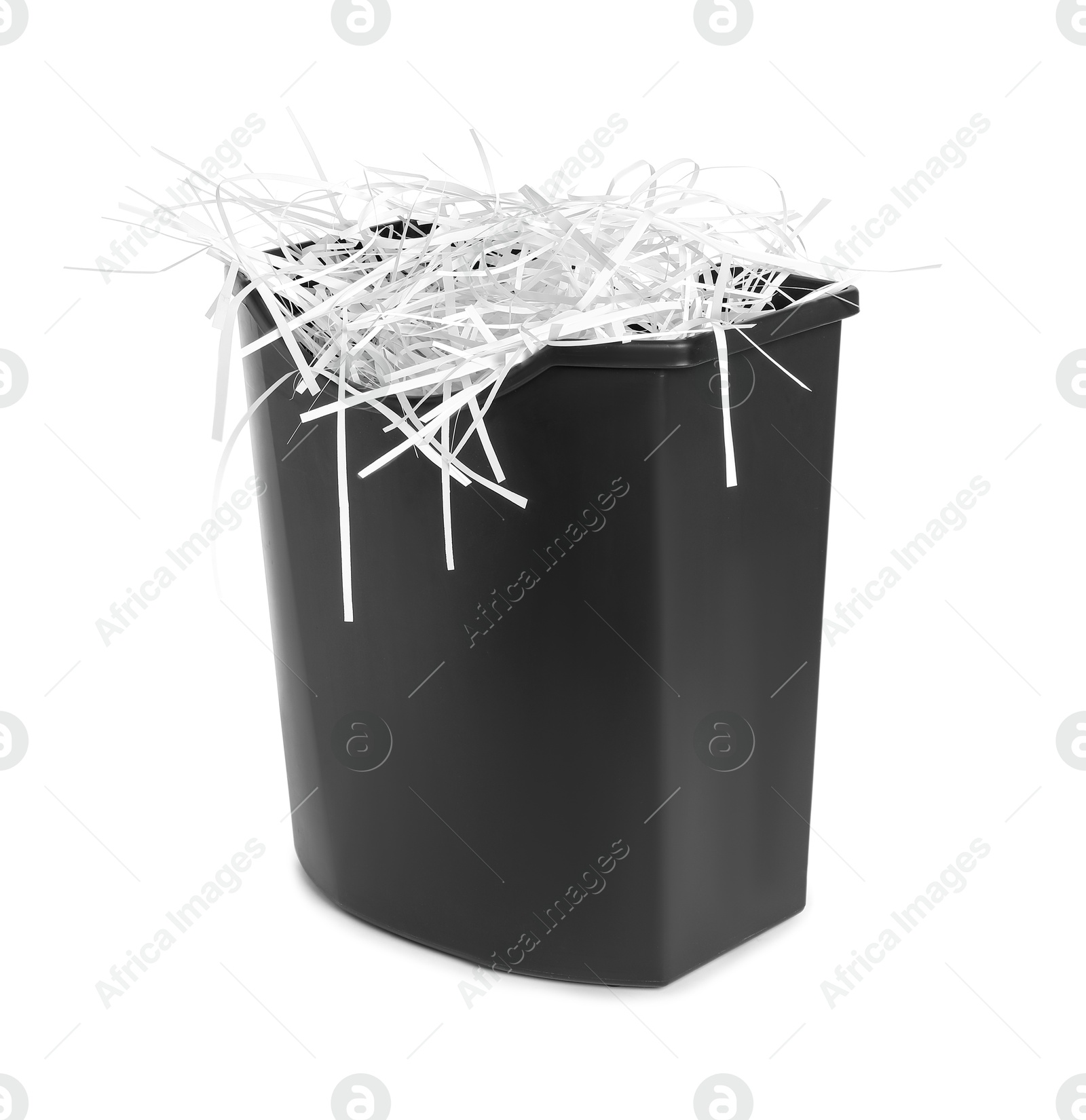 Photo of Shredded paper strips in basket isolated on white