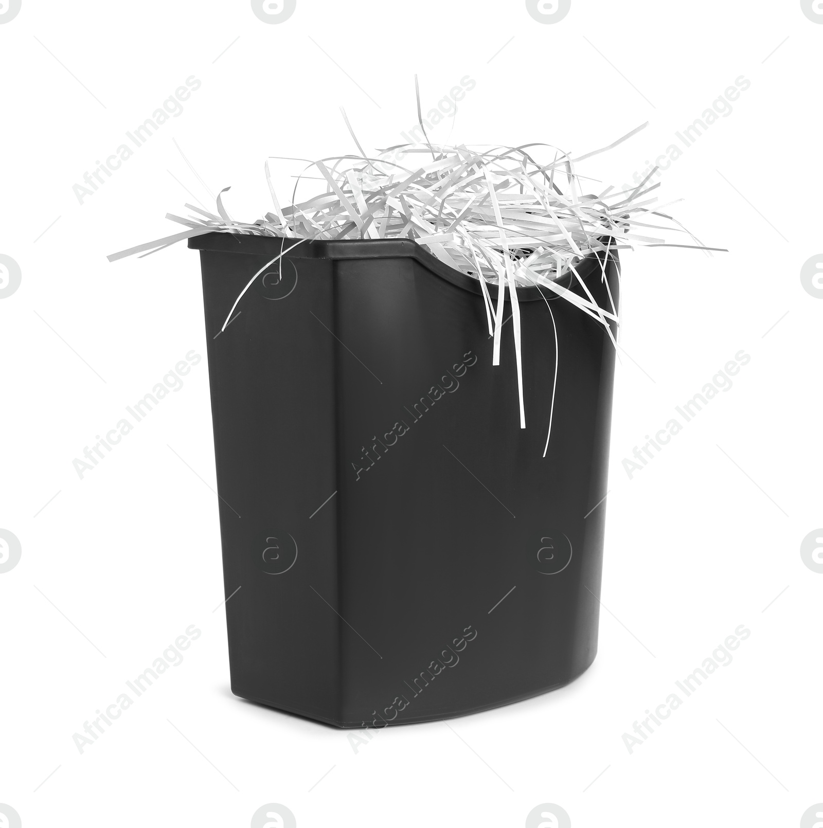 Photo of Shredded paper strips in basket isolated on white