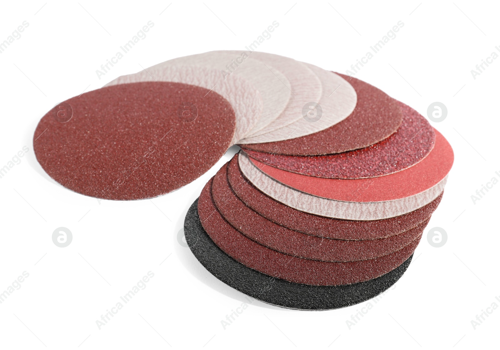 Photo of Many coarse sandpaper disks isolated on white