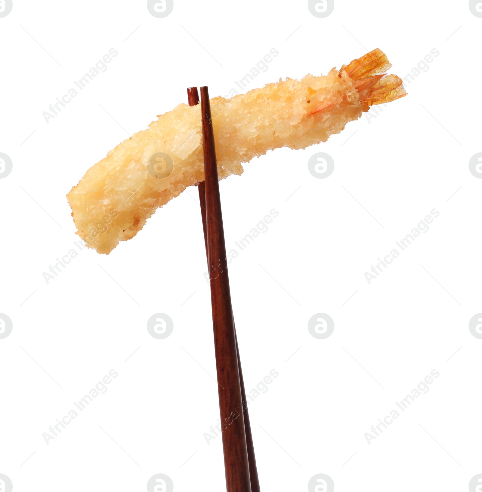 Photo of Chopsticks with delicious breaded fried shrimp isolated on white