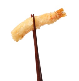 Chopsticks with delicious breaded fried shrimp isolated on white