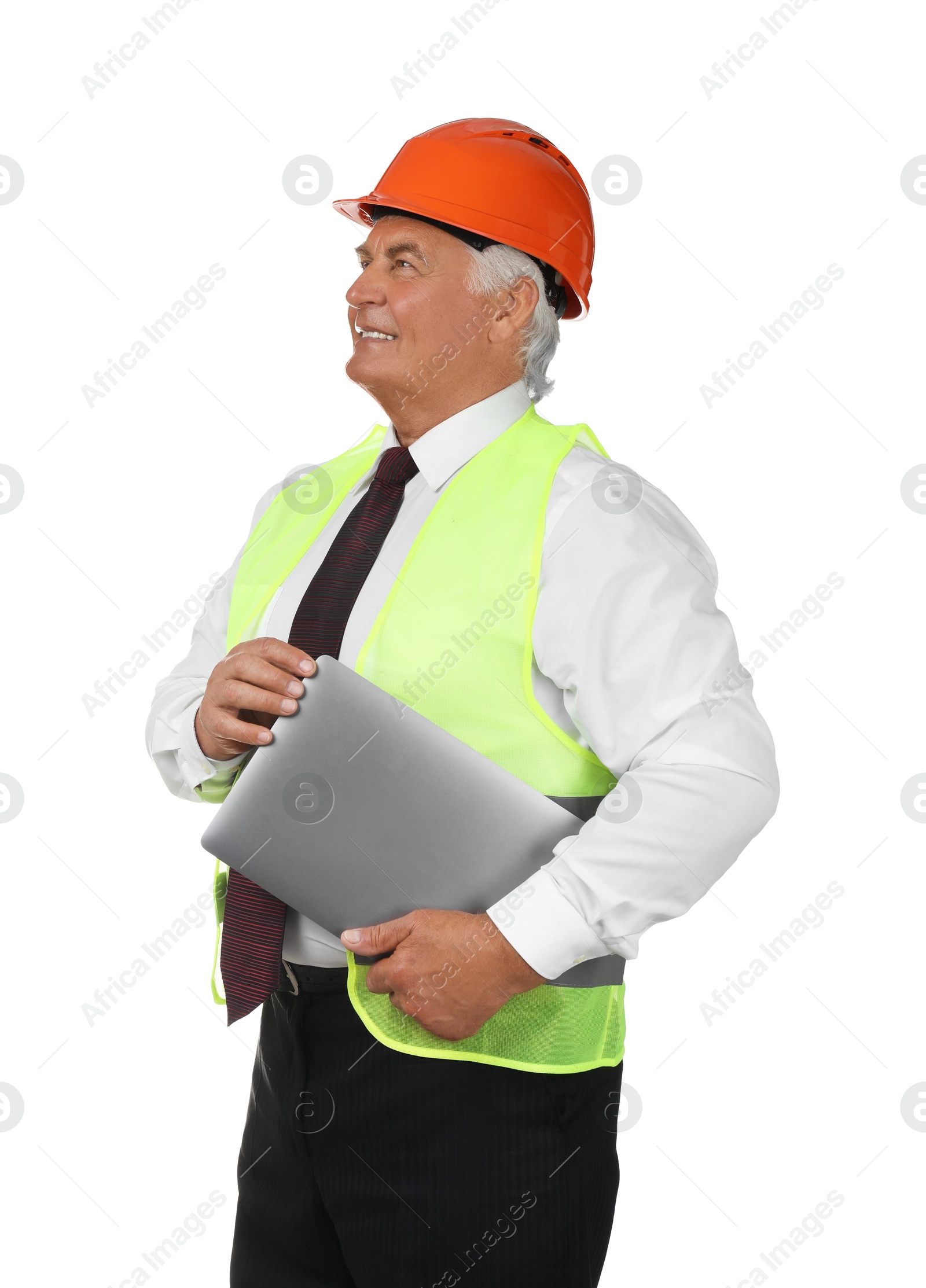 Photo of Engineer in hard hat with laptop on white background