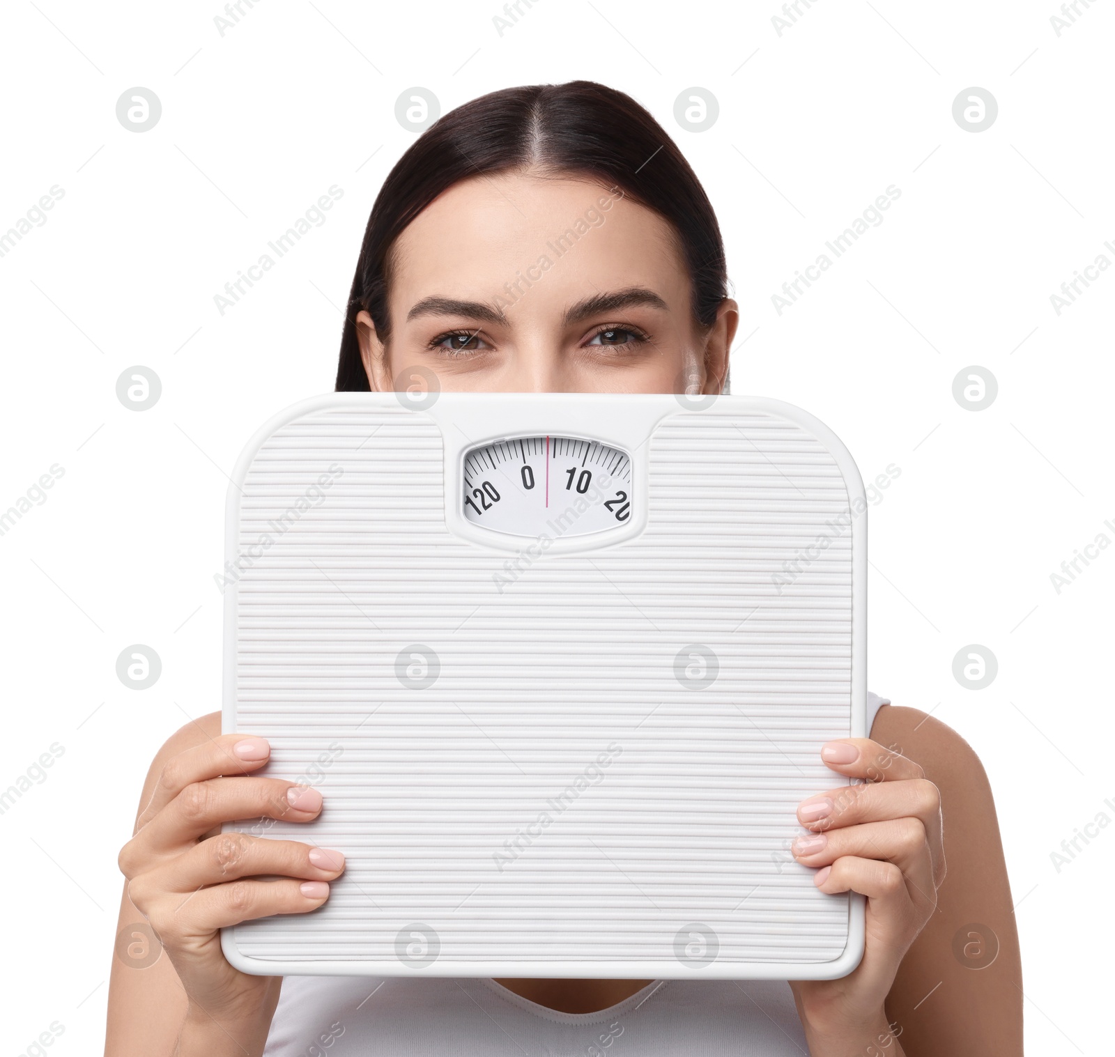 Photo of Diet and weight loss concept. Young woman with floor scale on white background