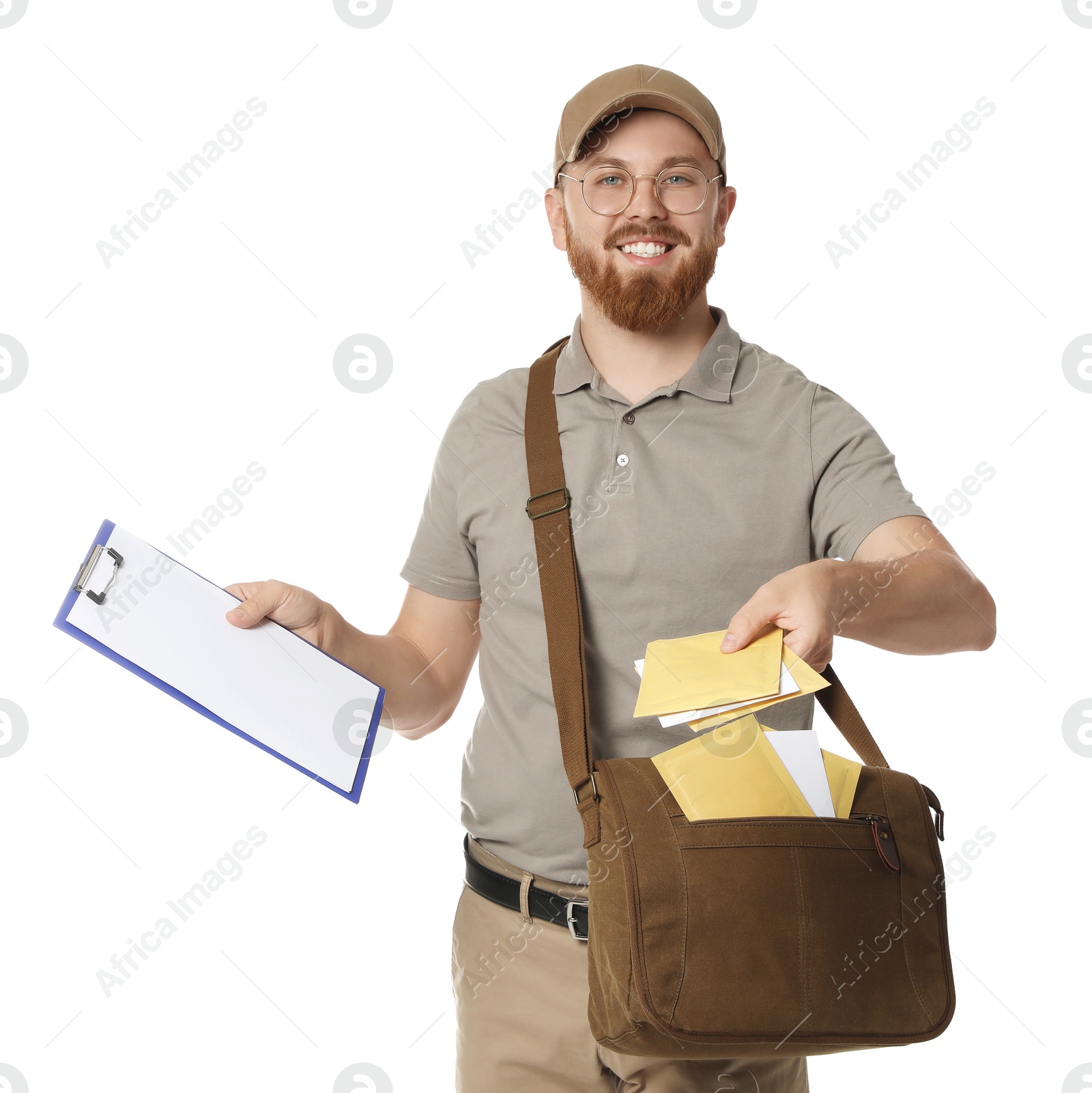 Photo of Happy young postman with brown bag delivering letters on white background