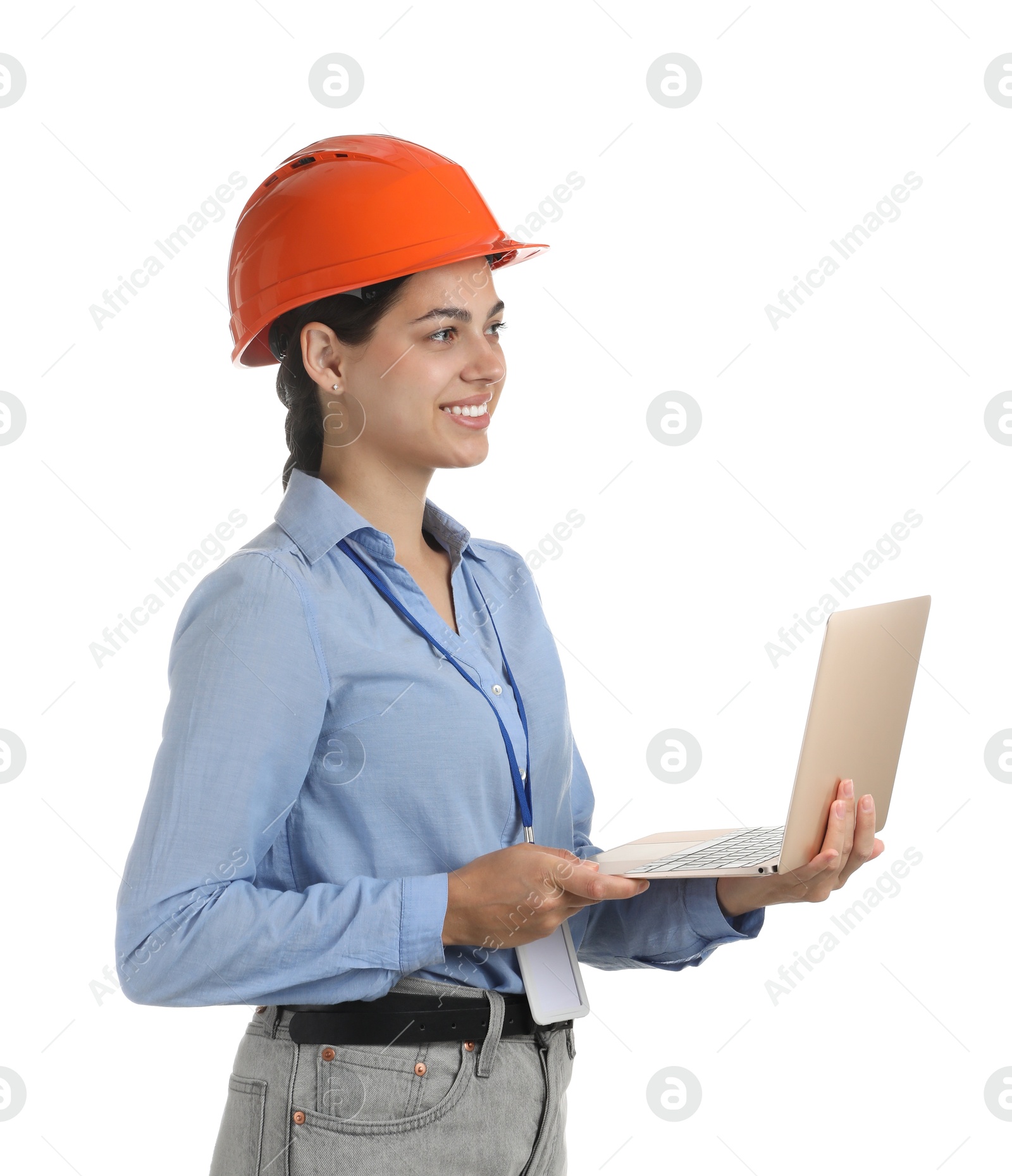 Photo of Engineer in hard hat with laptop on white background