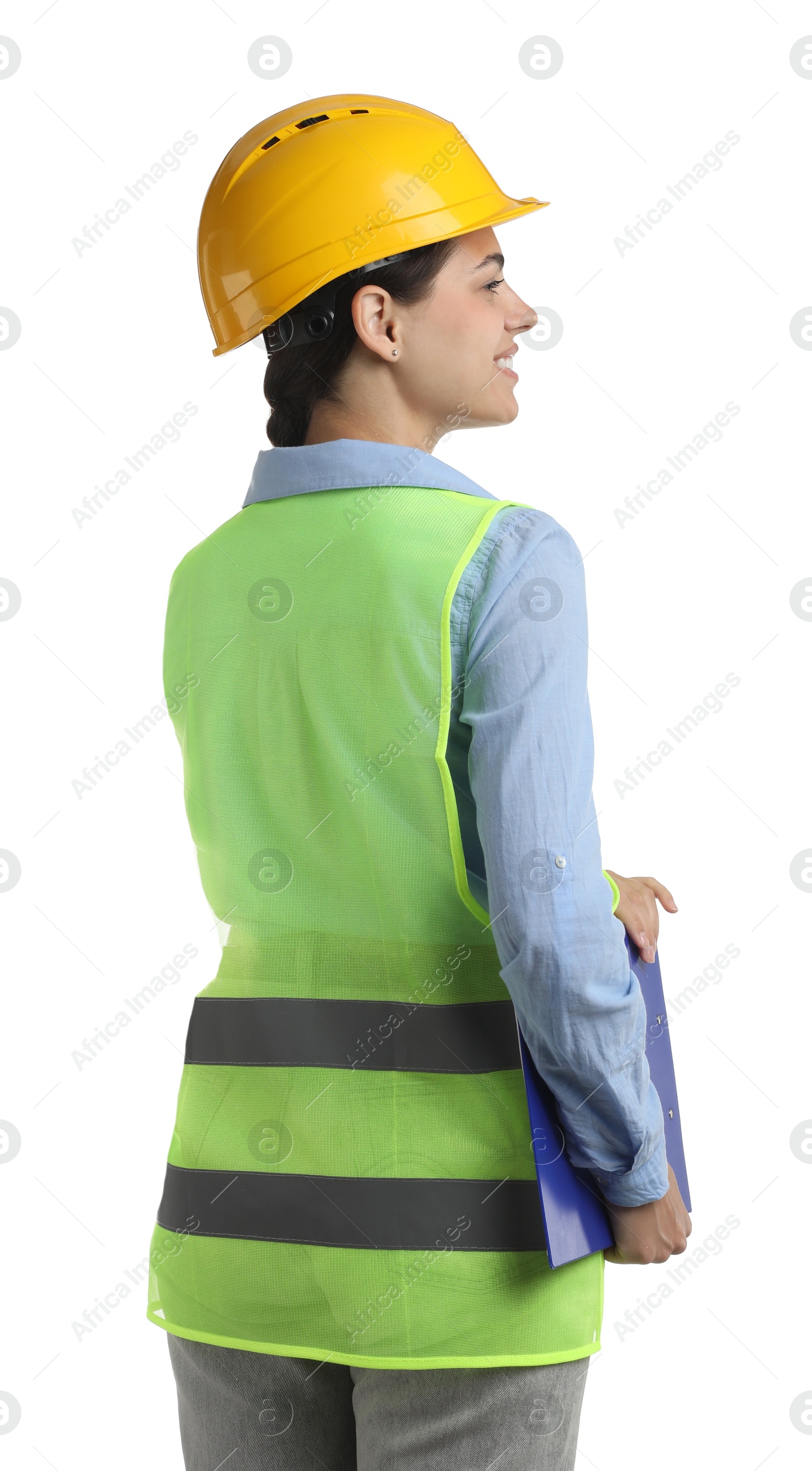 Photo of Engineer in hard hat with clipboard on white background