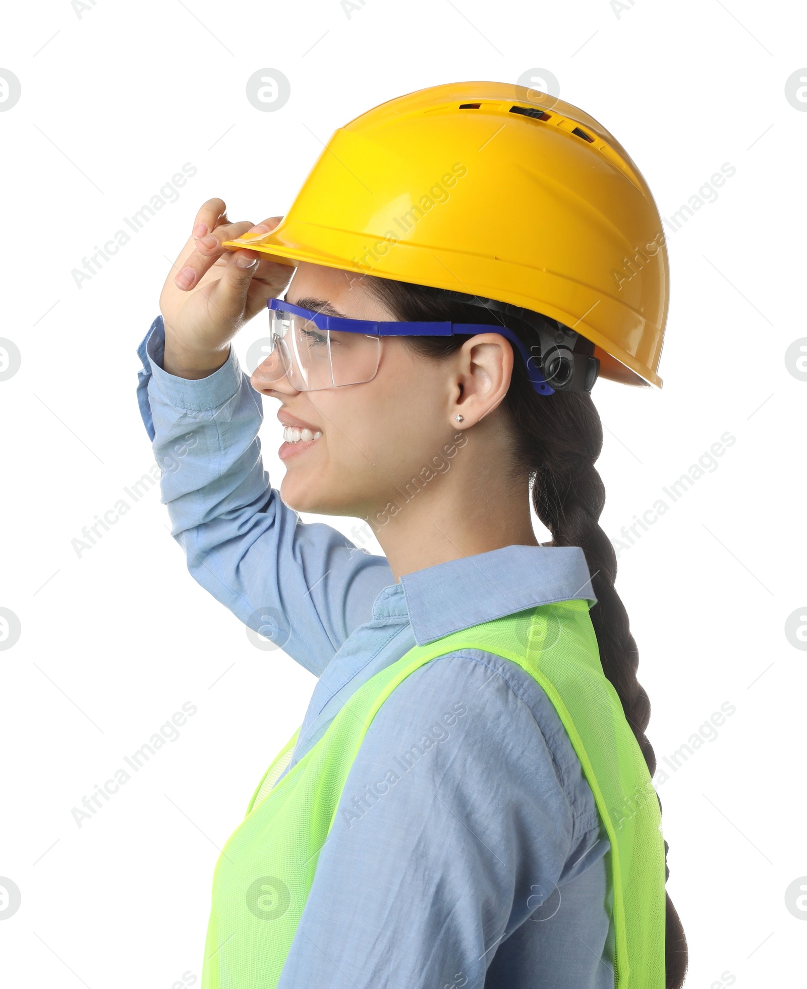 Photo of Engineer in hard hat and goggles on white background