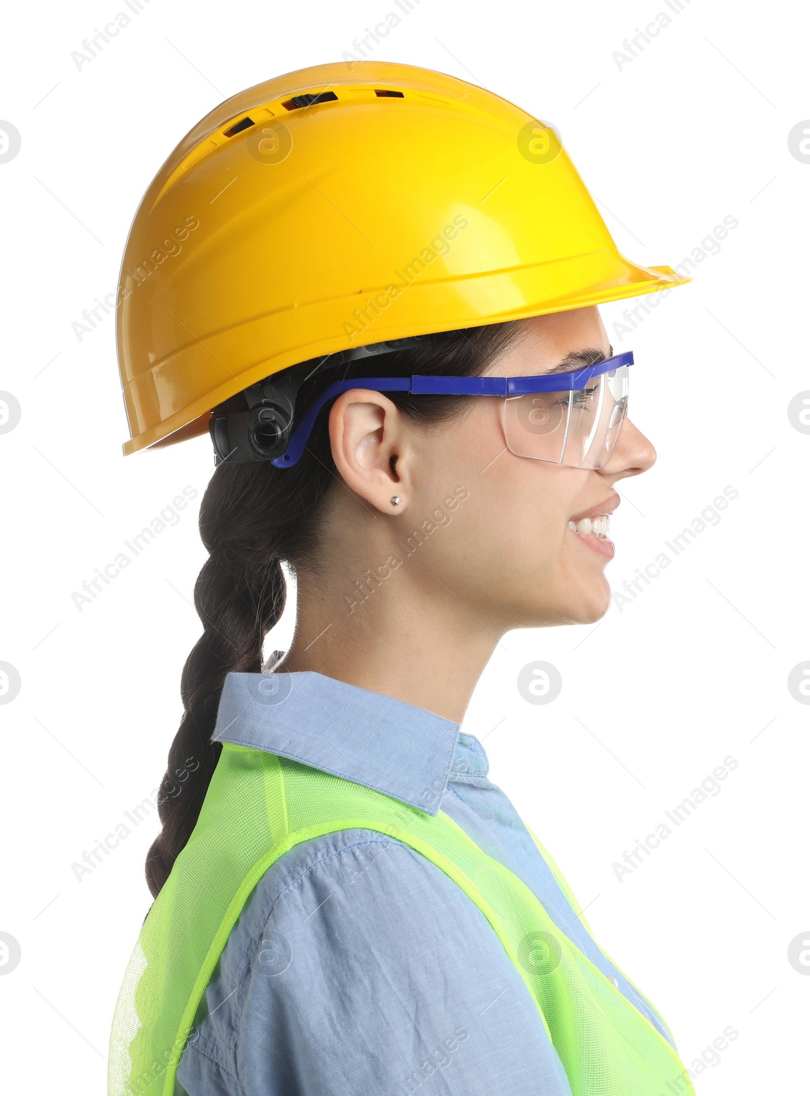 Photo of Engineer in hard hat and goggles on white background