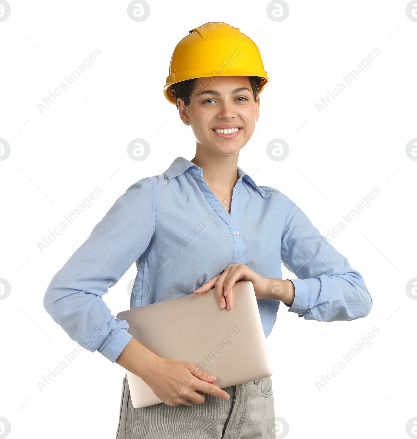 Photo of Engineer in hard hat with laptop on white background