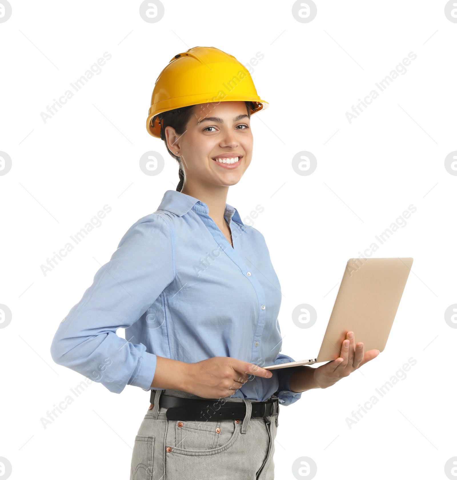 Photo of Engineer in hard hat with laptop on white background