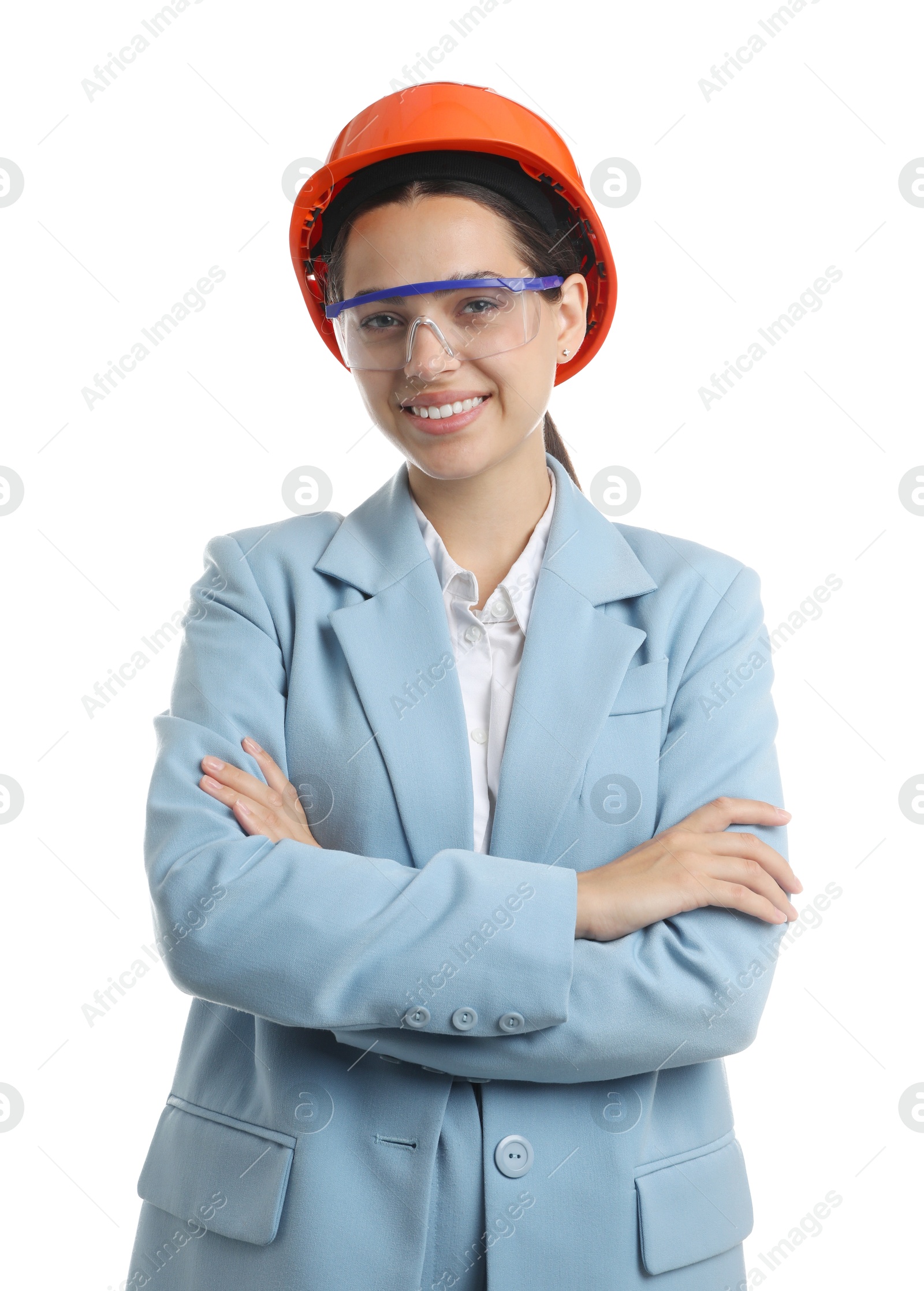 Photo of Engineer in hard hat and goggles on white background