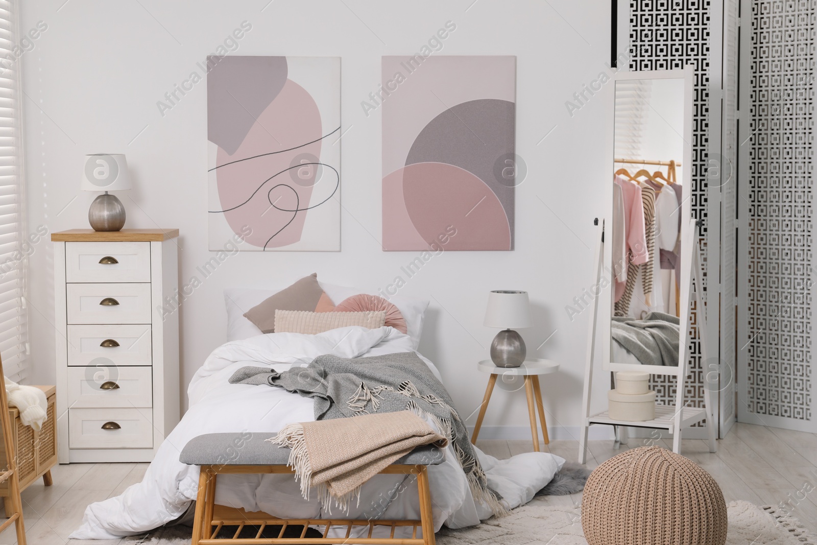 Photo of Teen's room interior with modern furniture and beautiful pictures on wall