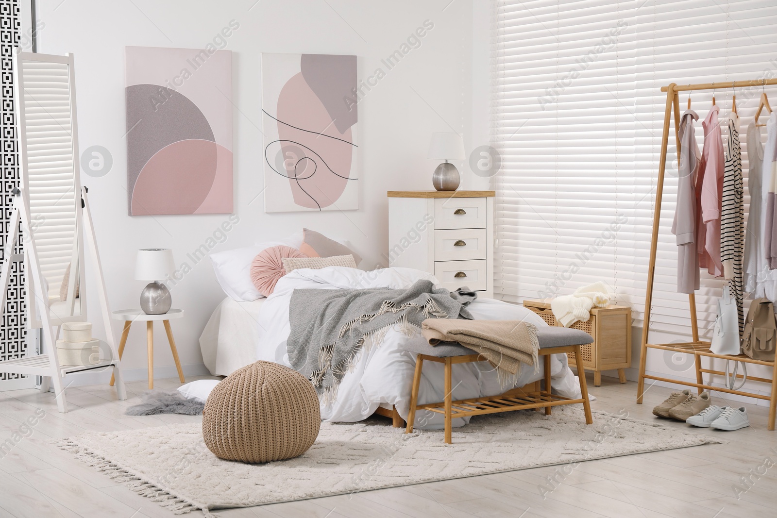 Photo of Teen's room interior with modern furniture and beautiful pictures on wall