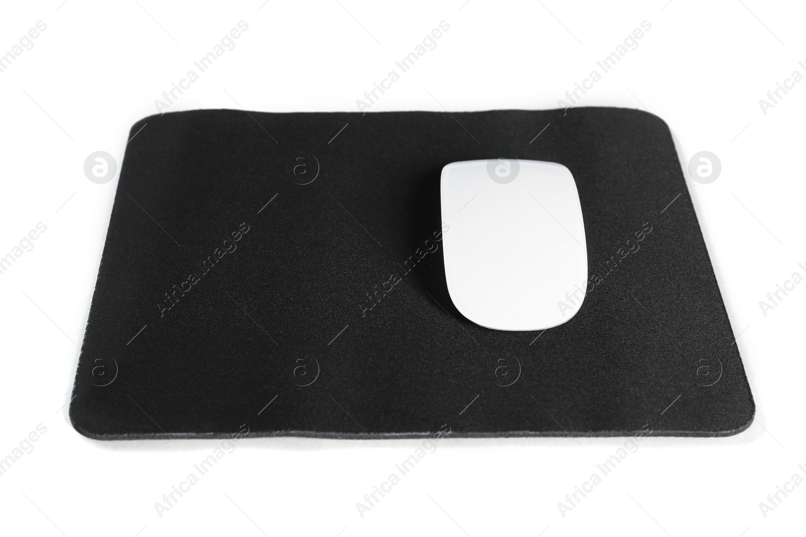 Photo of Wireless mouse and mousepad on white background