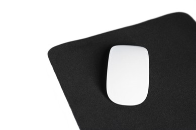 Photo of Wireless mouse and mousepad on white background