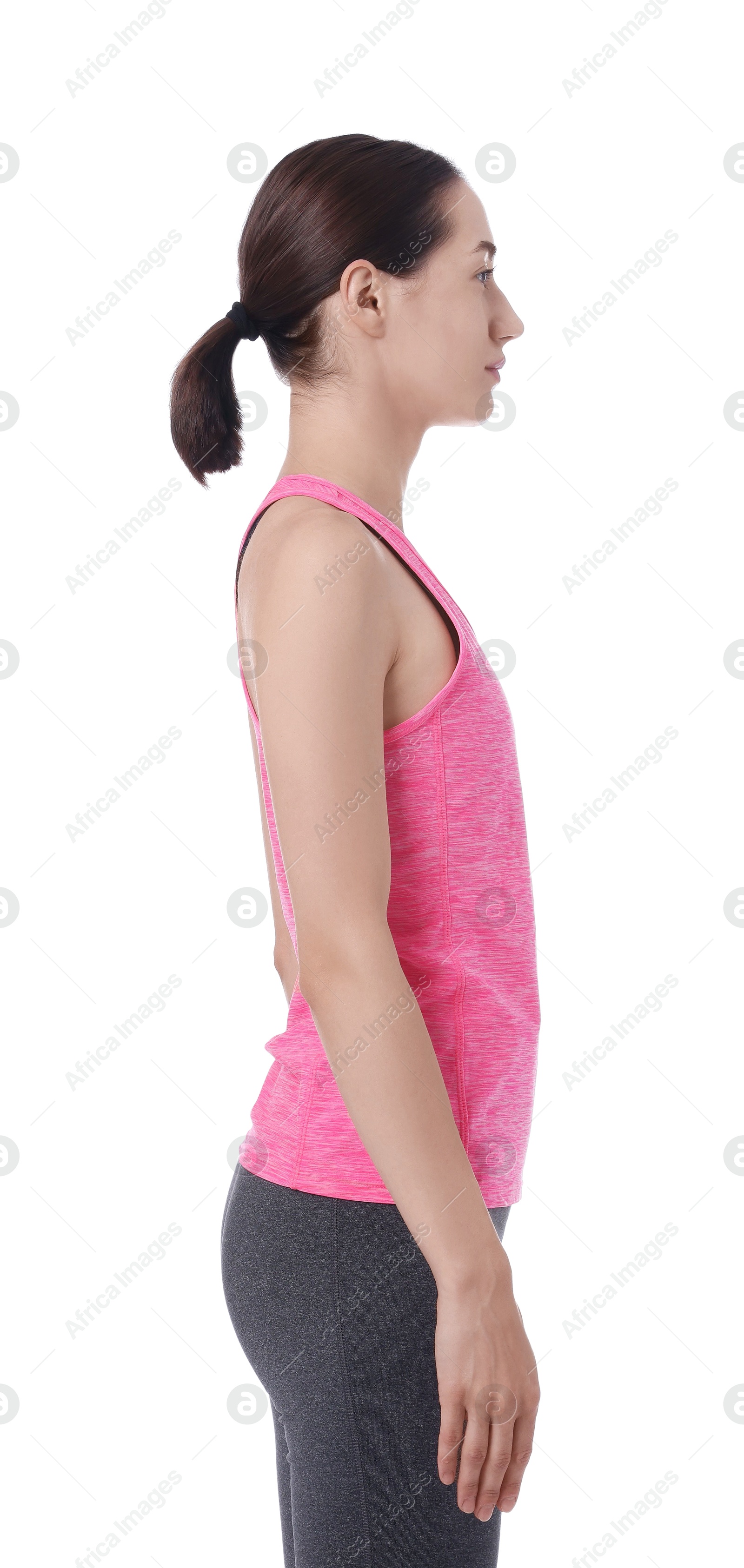 Photo of Woman with good posture wearing sportswear on white background