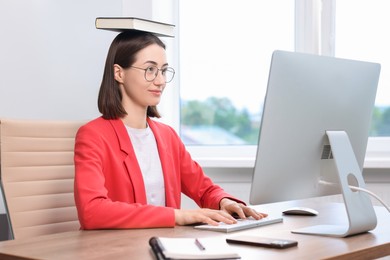 Woman with good posture working in office