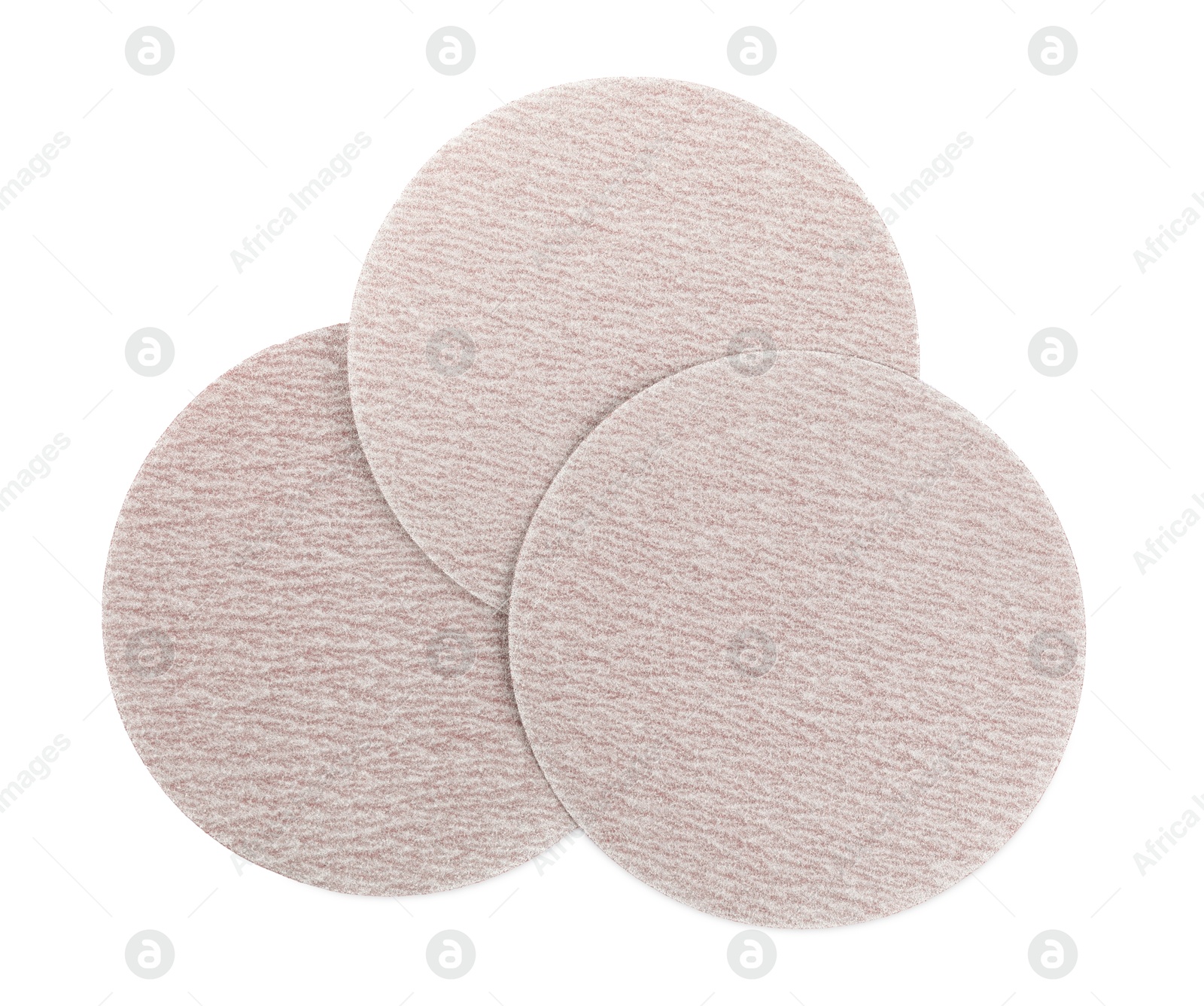 Photo of Coarse sandpaper disks isolated on white, top view