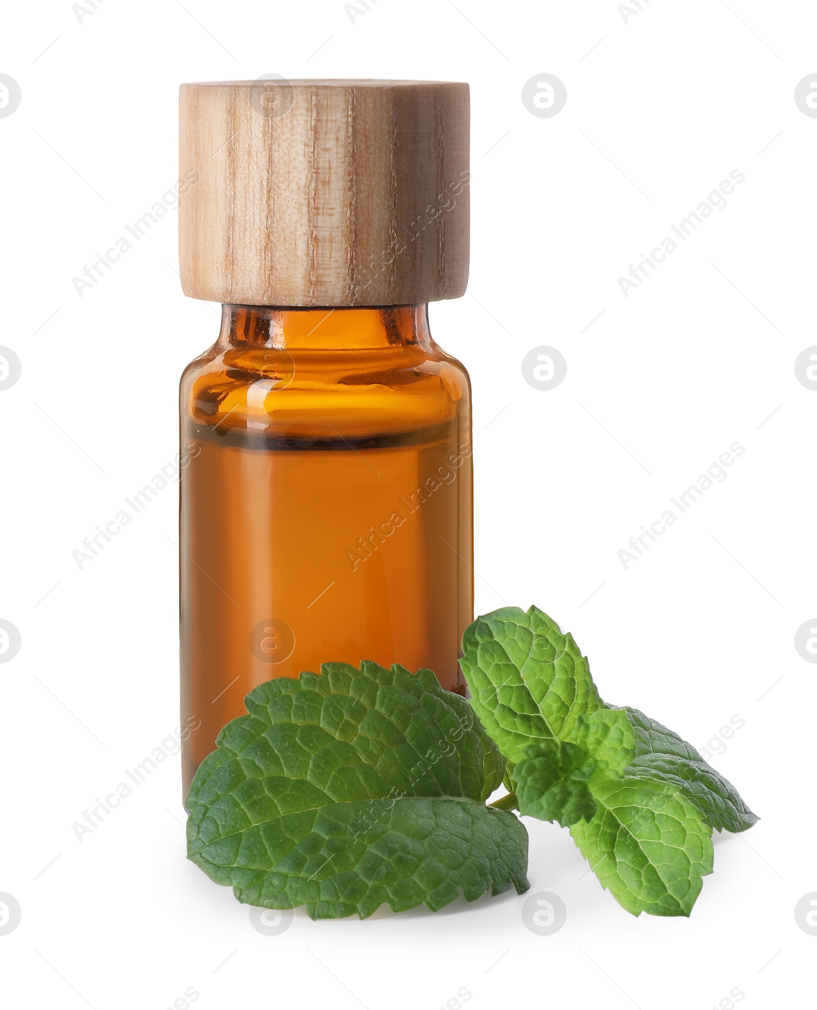 Photo of Bottle of essential oil and mint isolated on white