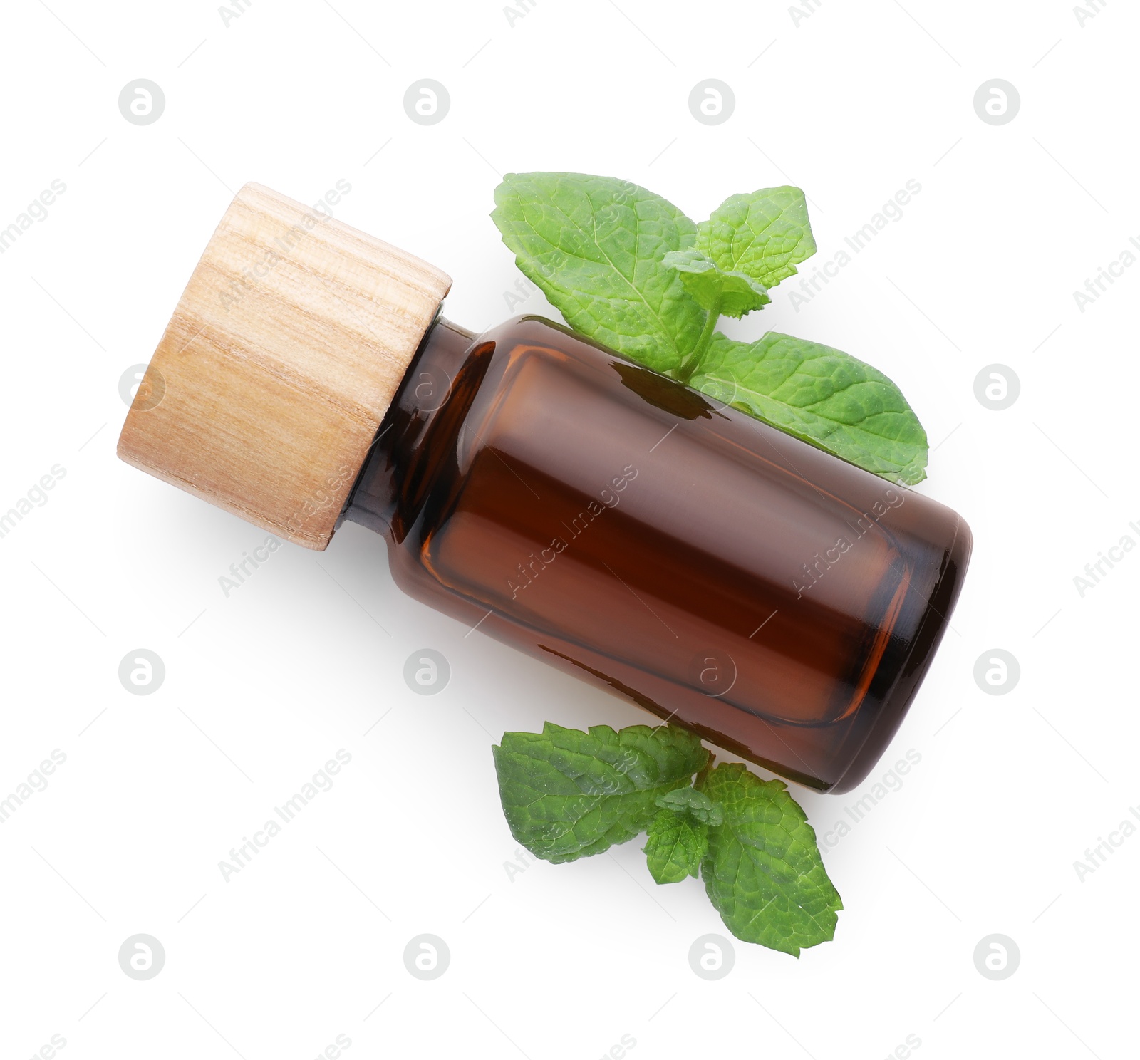 Photo of Bottle of essential oil and mint isolated on white, top view