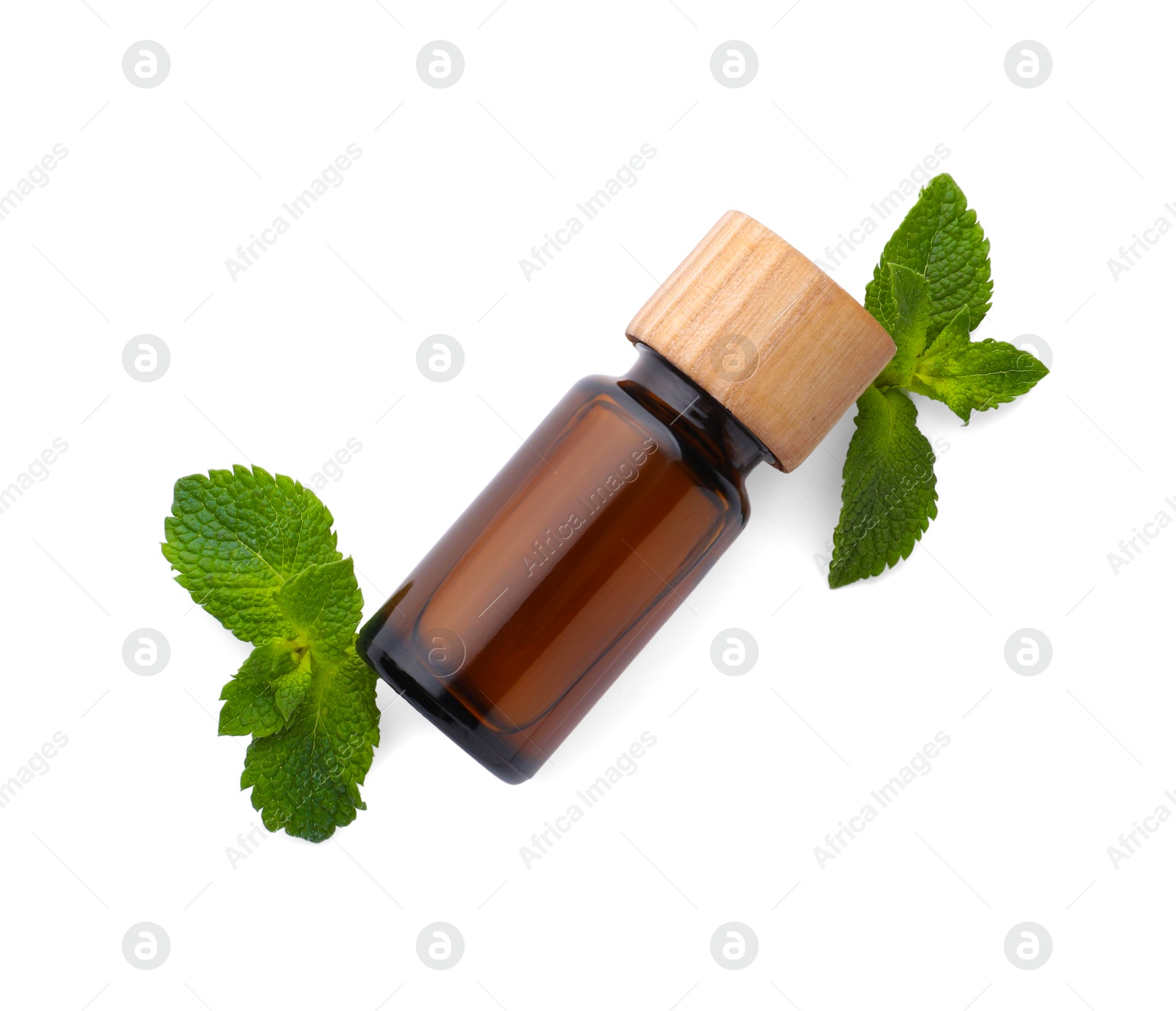 Photo of Bottle of essential oil and mint isolated on white, top view