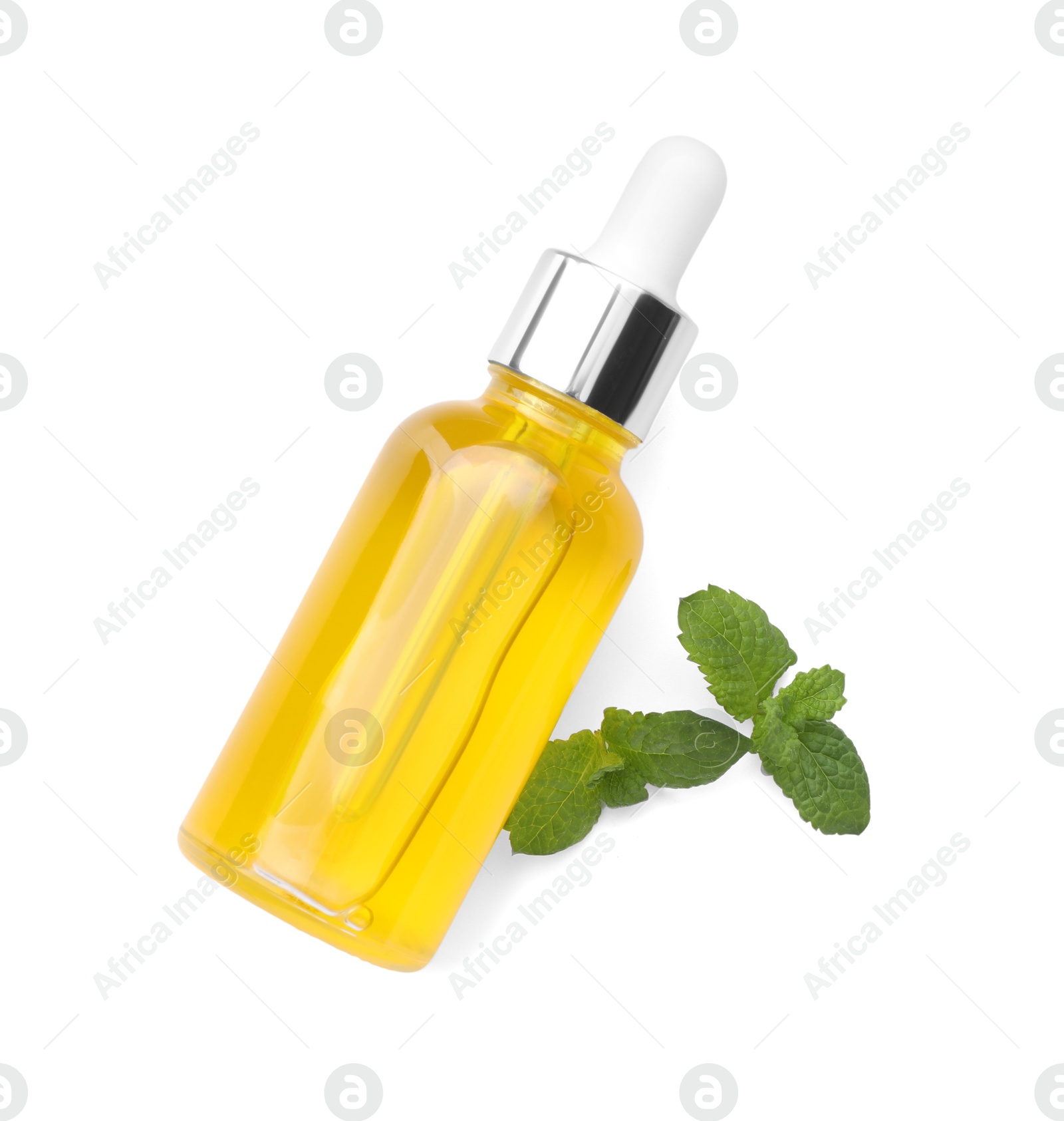 Photo of Bottle of essential oil and mint isolated on white, top view