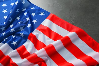 Flag of USA on black table, above view