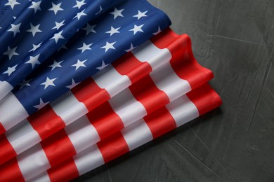 Photo of Flag of USA on black table, top view