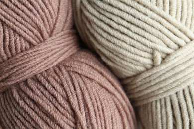 Photo of Two skeins of yarn as background, above view. Knitting material