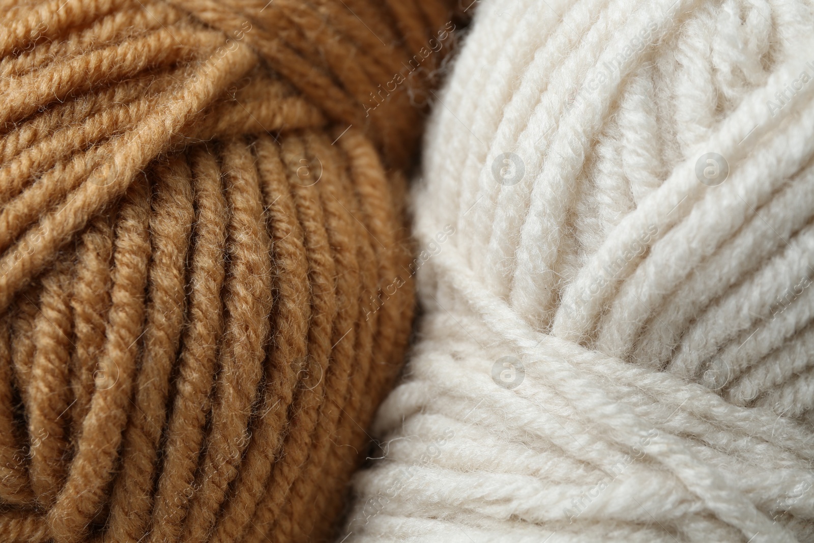 Photo of Two skeins of yarn as background, above view. Knitting material