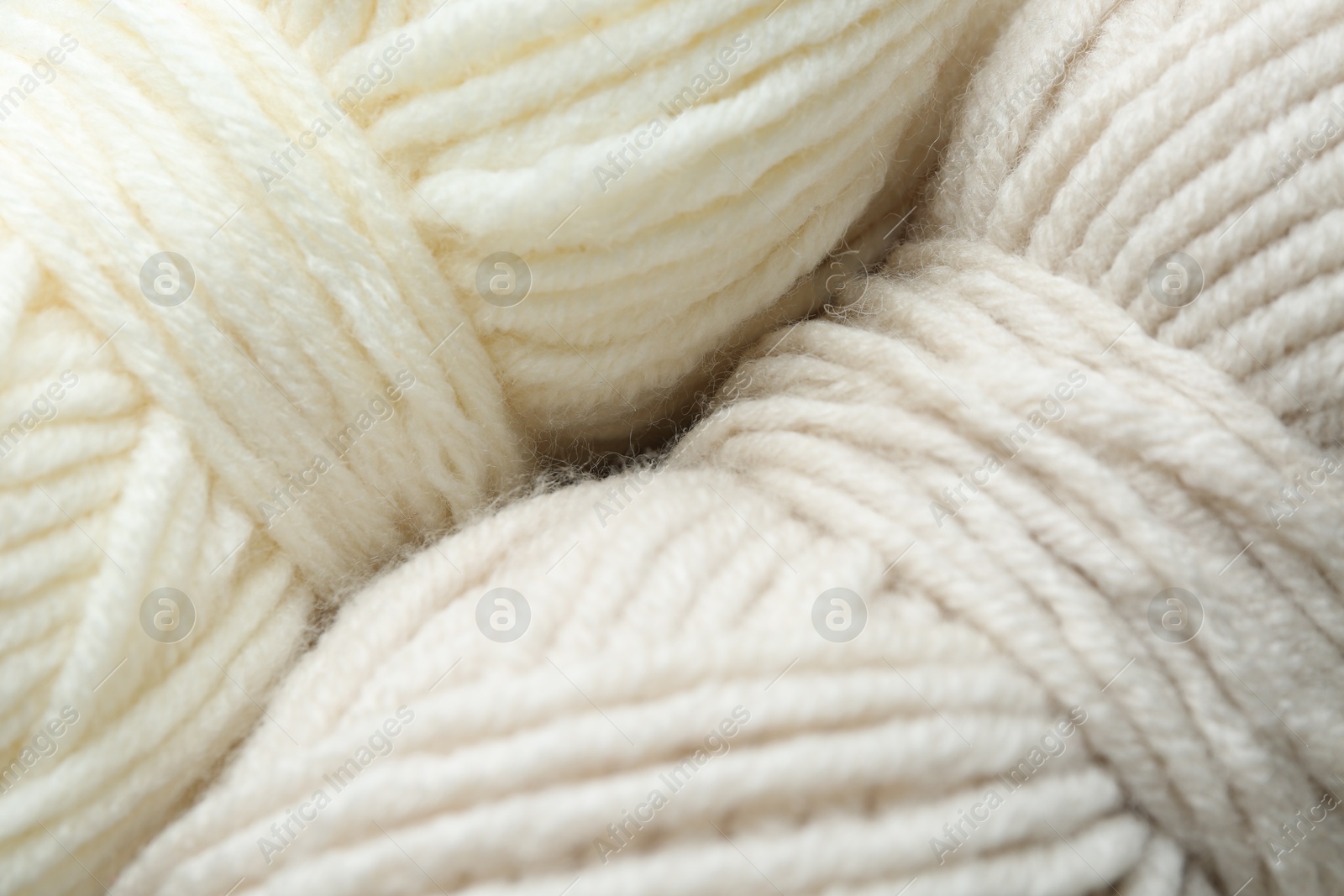 Photo of Two skeins of yarn as background, above view. Knitting material