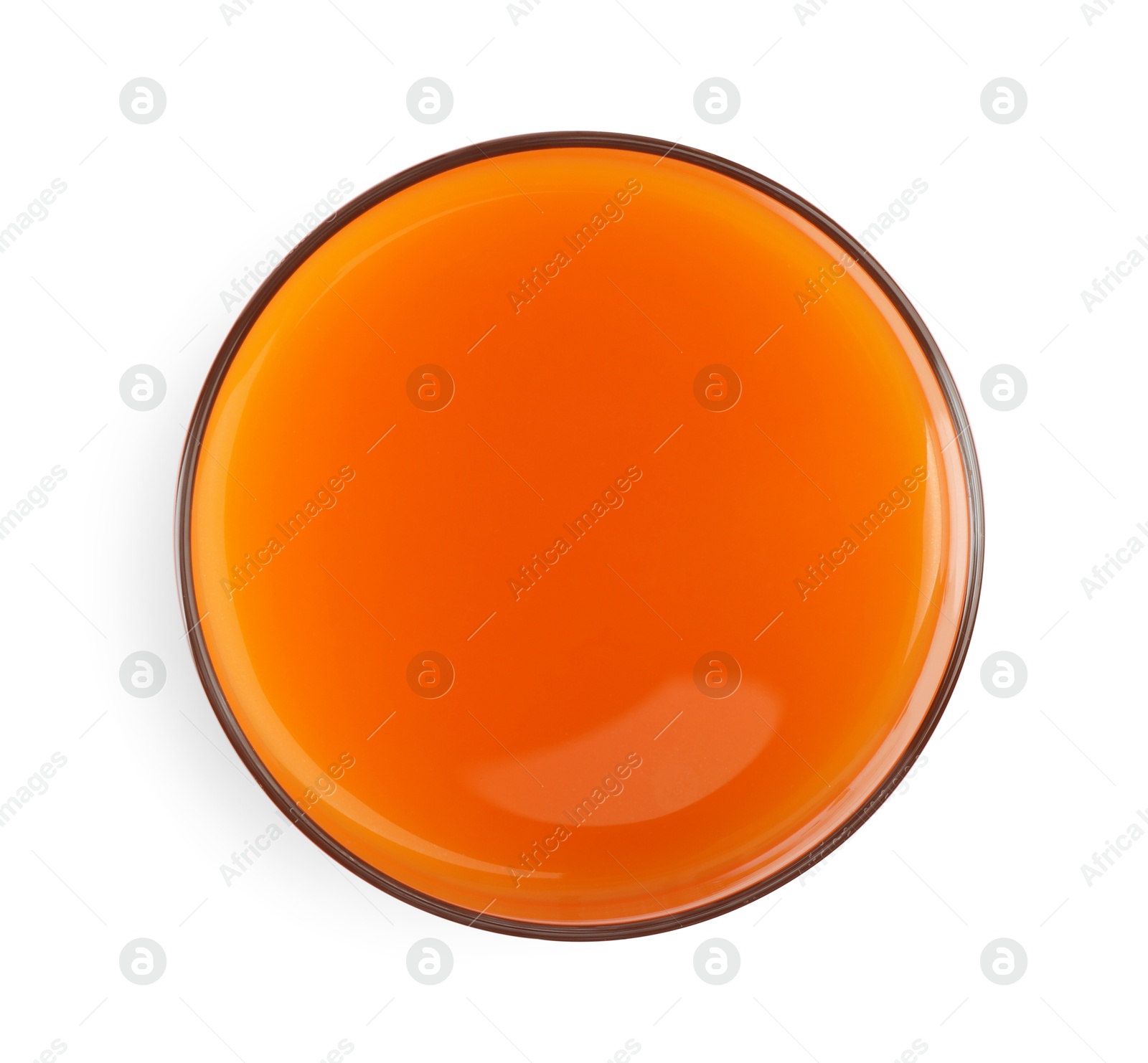 Photo of Healthy carrot juice in glass isolated on white, top view