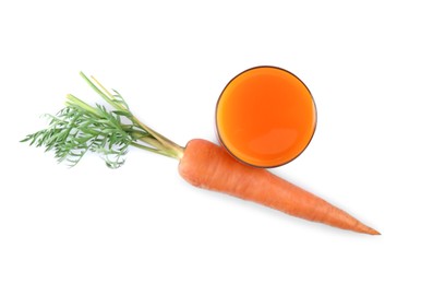 Photo of Healthy carrot juice in glass and fresh vegetable isolated on white, top view