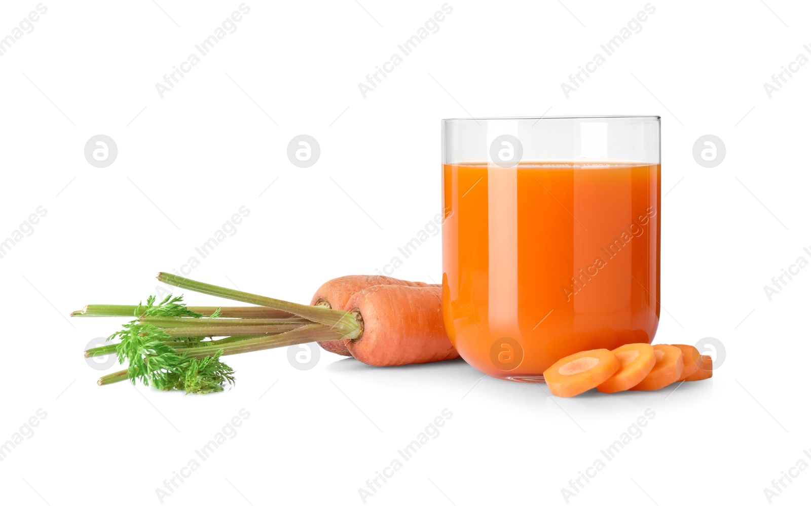 Photo of Healthy carrot juice in glass and fresh vegetables isolated on white