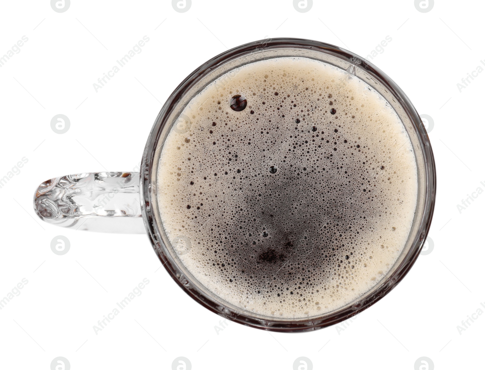 Photo of Glass mug of dark beer isolated on white, top view