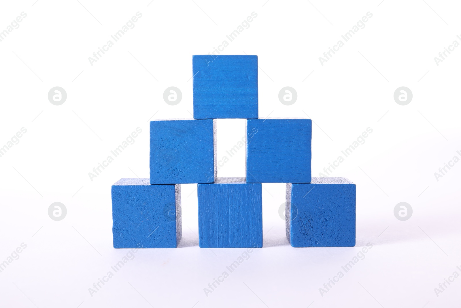 Photo of Many blue wooden cubes on white background